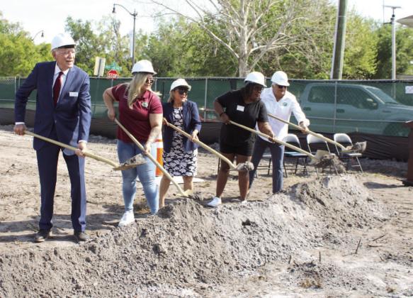 Leaders from Osceola County, the City of Kissimmee and Park Place Behavioral Health Services helped break ground Friday on the Dillingham Apartments project. PHOTO/TERRY LLOYD