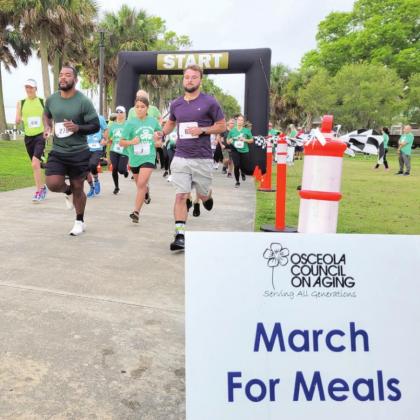 Runners take to the Kissimmee Lakefront trail for the start of Saturday’s March For Meals 5K fundraiser for Osceola Meals on Wheels. PHOTO/OSCEOLA COUNCIL ON AGING