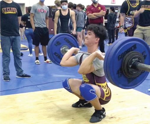 St. Cloud’s Julian Sykes successfully lifts 260 pounds in the clean and jerk on his way to a victory in the 154-pound weight class of the Class 3A, Region 3 Championships. With the class win, Sykes automatically qualifies for the state meet. PHOTO/ST. CLOUD HIGH SCHOOL