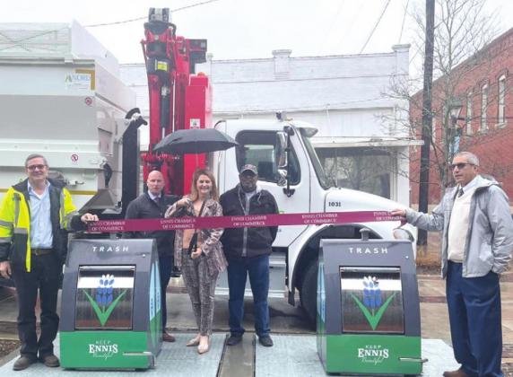 Underground Refuse Systems, including CEO Jay Wheeler (right) held a ribbon cutting Jan. 25 in Ennis, Texas, to celebrate the start of that city’s working with the underground units. PHOTO/UNDERGROUND REFUSE SYSTEMS