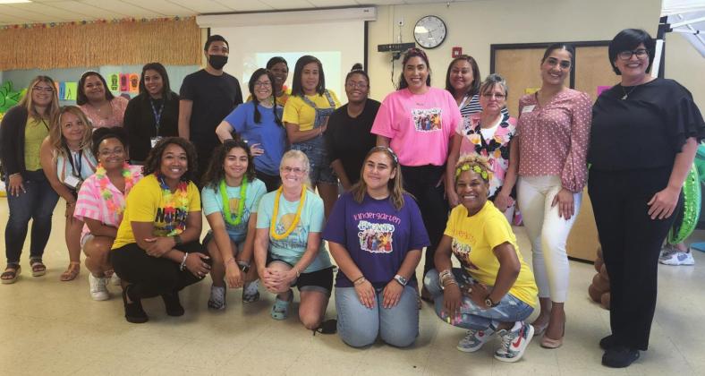 The teachers and volunteers of Renaissance Charter School in Poinciana’s 21st Century Community Learning Center program give Director Melisa Jimenez (right)a warm send-off Thursday. PHOTO/KEN JACKSON