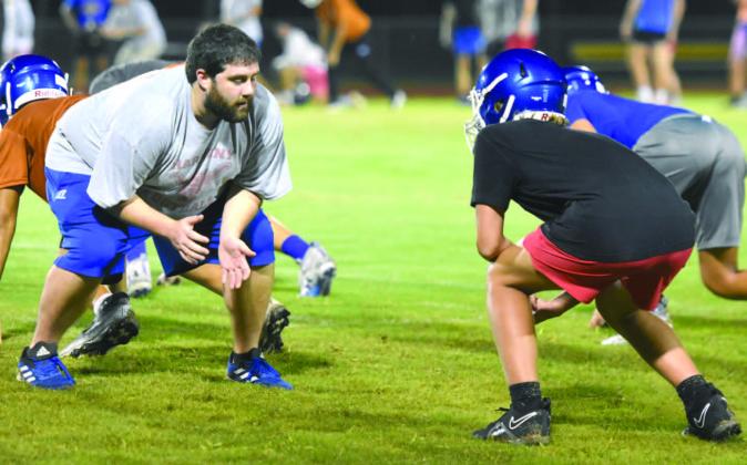Harmony High has held practices at 5 a.m. to beat the afternoon heat, humidity and thunderstorms. PHOTO/KATIE WILLIAMS