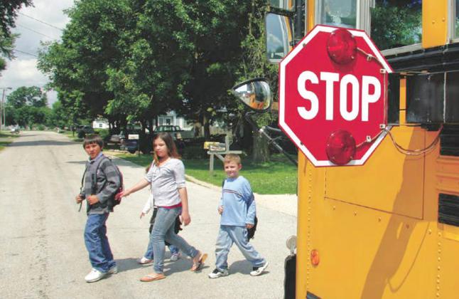 Penalties for passing a stopped bus on the side where children enter and exit has risen from $200 to $400 for a first offense. PHOTO/METRO