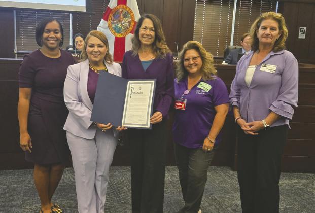 Help Now of Osceola received proclamations from the cities of St. Cloud and Kissimmee and, pictured Monday, Osceola County in honor of its work during Domestic Violence Awareness Month.