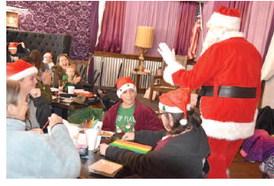 A Hero For Kids held a Christmas brunch for needy families Sunday; its annual gala is Jan. 7. PHOTO/A HERO FOR KIDS