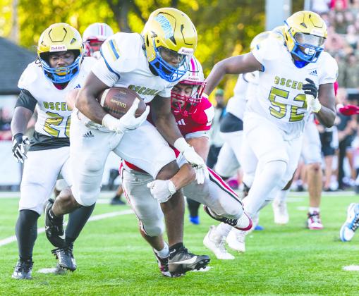 Running backs Taevion Swint (4) and T.J. Griffin (1) will be asked to carry the load on the ground in Friday’s Osceola-St. Cloud game, the 101st playing of the rivalry. PHOTOS/TAYLOR MCFEE