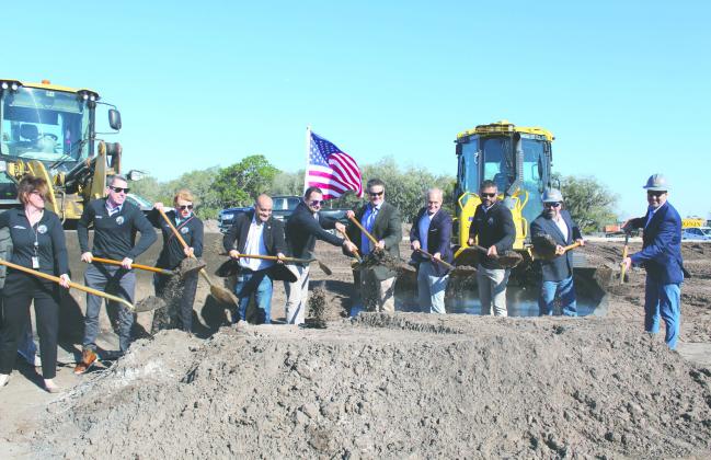 Osceola School District officials broke ground in February on a new K-8 school in the Kindred neighborhood. That $75 million project is among a number of projects being planned, designed or opened at a total cost of $919 million in construction. PHOTO/KEN JACKSON
