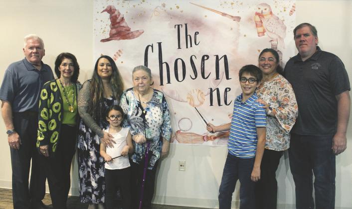 Jasper, Chris and Sim Stafford (at right), along with more of their extended family, celebrated becoming an official family at the Osceola County Courthouse Friday during a Florida Adoption Month celebration. PHOTO/KEN JACKSON