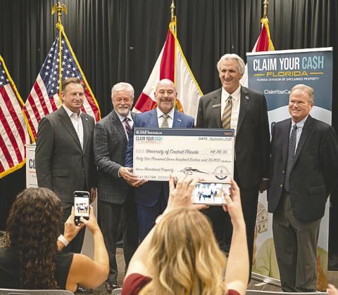 Florida CFO Blaise Ingoglia presented a check for $41,716 in unclaimed funds to the University of Central Florida on Sept. 15. The state was holding it, and returned it through the Claim Your Cash Florida program. (Photo/ Florida CFO Blaise Ingoglia)