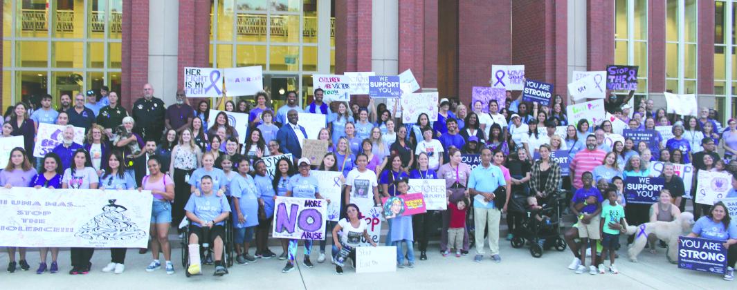 Strength in numbers — hundreds turned out for Help Now’s annual Awareness Walk and Candlelight Vigil last Thursday, to raise up domestic violence survivors and remember its victims. PHOTOS/KEN JACKSON