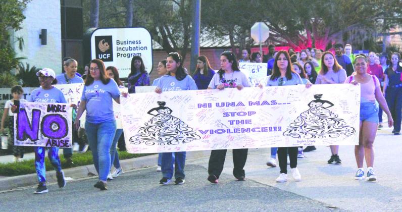 Strength in numbers — hundreds turned out for Help Now’s annual Awareness Walk and Candlelight Vigil last Thursday, to raise up domestic violence survivors and remember its victims. PHOTOS/KEN JACKSON