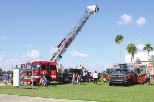 Tower 11, Kissimmee Fire Department’s new bucket truck that can elevate to 100 feet, was on display at Saturday’s Fire Safety Fest. PHOTO/TERRY LLOYD