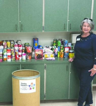 Tammi Madison and her Pantry Planters staff, stocking a new pantry at Harmony High School. She said Osceola’s school superintendent has a goal of placing a pantry in every county school. (Photo/Pantry Planters)