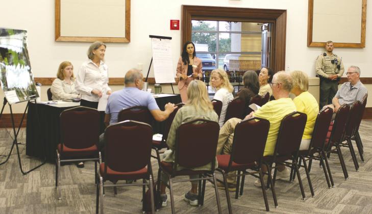 Residents opposed to the land transfer for Split Oak Forrest relay their concerns to an FWC facilitator at a meeting with Florida Fish and Wildlife Commission staff last week at Osceola Heritage Park to let their opinions and voices be heard. PHOTO/TERRY LLOYD