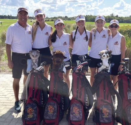 St. Cloud golf coach Jim Endicott (far left) is stepping down after both Bulldog boys and girls golf teams qualified for the state tournament last year and won a combined 10 Orange Belt Conference championships in six years. PHOTO/DAN PEARSON