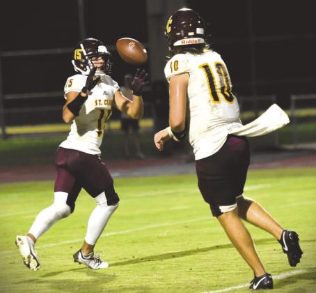 St. Cloud quarterback Logan King (10) threw six touchdown passes in a 51-18 victory over Miami Tru Life Academy. Owen Conner (15) caught three of them and had 220 yards receiving. PHOTO / KATIE WILLIAMS