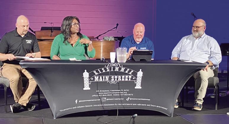 Left to right, Kissimmee officials Benjamin Burnett, Desiree Matthews, Mike Steigerwald and Craig Holland present a town hall update last week on downtown Kissimmee projects. PHOTO/DAVID CHIVERS