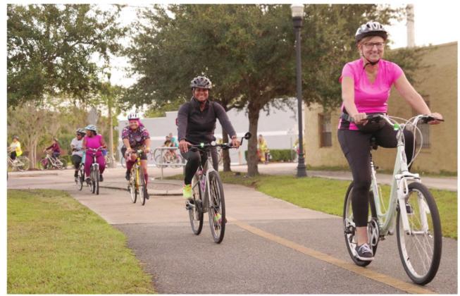 Bikers take to the trail at a prior ReThink Your Commute bike event. Drivers in downtown Kissimmee should watch for a cavalcade of cyclists Friday morning. PHOTO/RETHINK YOUR COMMUTE