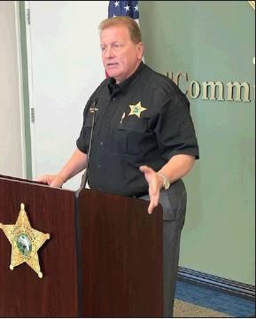 NEWS-GAZETTE PHOTO/BRIAN MCBRIDE Osceola County Sheriff Russ Gibson speaks to the media during a press conference on Wednesday about the Celebration homicides.