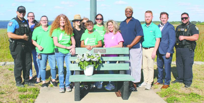 Supporters dedicated a St. Cloud Lakefront Park bench, overlooking a peaceful spot on East Lake Toho, to the memory of slain 13-year-old Madeline Soto. (Photos/Ken Jackson)