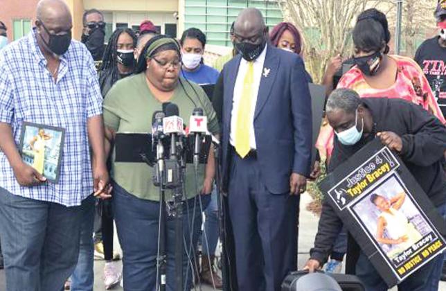 Taylor Bracey’s parents and civil rights attorney Ben Crump speak at a press conference on Saturday in front of the Osceola County Sheriff’s Office. NEWS-GAZETTE PHOTO/CHARLIE REED