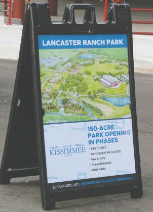 City of Kissimmee officials cut the ceremonial ribbon on Lancaster Ranch Park Tuesday, which includes a new location for longtime area attraction Green Meadows Petting Farm. PHOTO/KEN JACKSON