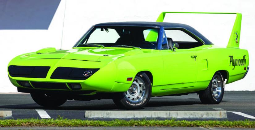 These antique automobiles, a 1970 Plymouth Superbird and a 1977 Ford Bronco, are among the nearly 5,000 classic cars expected to reach the auction block at the next Mecum Kissimmee auction, Jan. 2-14 at Osceola Heritage Park. PHOTOS/MECUM