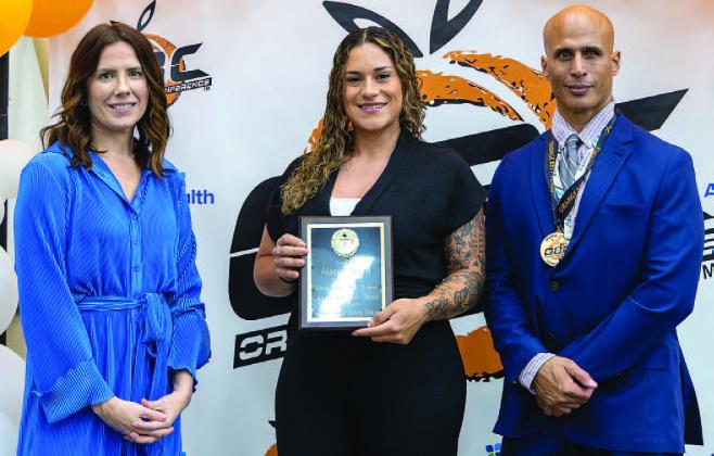 Weightlifting coach Alanie Cora was the Tohopekaliga High Coach of the Year. (Photo/Taylor McFee)