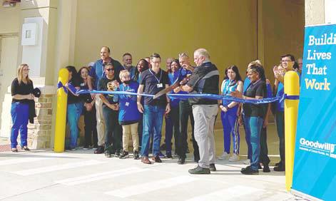 The Goodwill Donation Tunnel ribbon cutting ceremony with Central Florida Goodwill CEO Ed Durkee PHOTO/CHRIS MILLER