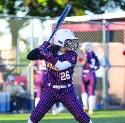 St. Clouds Skylah Rodriguez loads up to turn on a pitch in the District 7A-6 championship game. She scored the Bulldogs’ second run of a 3-2 win over Harmony on a single by Sheyene Hawkins. The Bulldogs host Boone in Thursday's regional quarterfinal playoffs. (Photo/Taylor McFee)