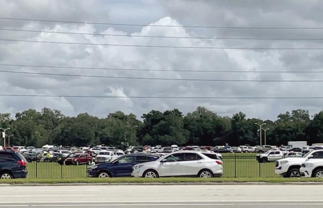 Residents flocked to Osceola Heritage Park Tuesday to get last-minute sandbags. PHOTO/TONI ROWAN