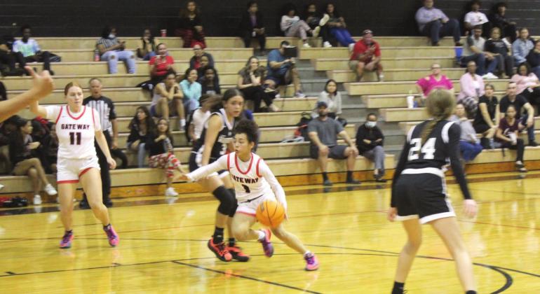 Gateway point guard Neri Moreau drives through the lane in the Panthers’ 88-45 win over City of Life Monday. GHS is undefeated in county play thus far. PHOTO/KEN JACKSON