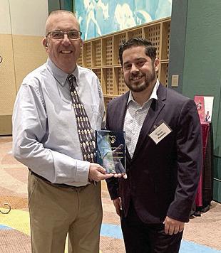 Bill Morris (left), named Boys and Girls Clubs of Central Florida Volunteer of the Year, with Nicco Palmero, regional director of the Boys and Girls Clubs of Central Florida. SUBMITTED PHOTO