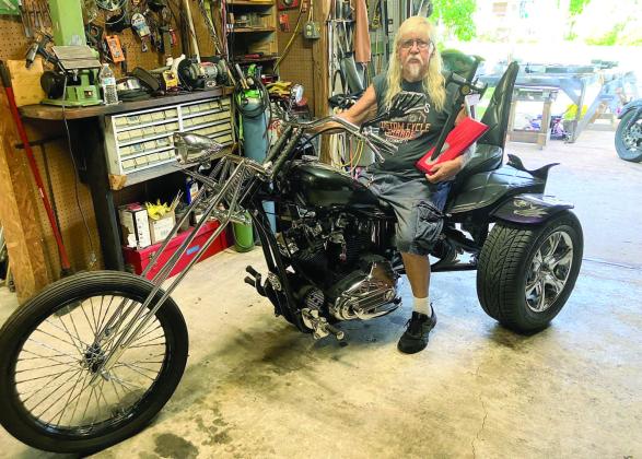 Kissimmee’s David Heeter, 82, won a design championship this year for his custom-built 1968 Triumph chopper. PHOTOS/DAVID CHIVERS