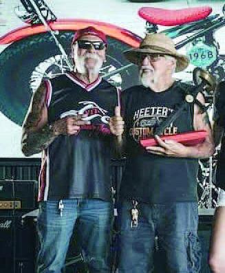 Kissimmee’s David Heeter, 82, won a design championship this year for his custom-built 1968 Triumph chopper—and got kudos from Orange County Choppers owner and TV personality Paul Tuttle, Sr. SUBMITTED PHOTO