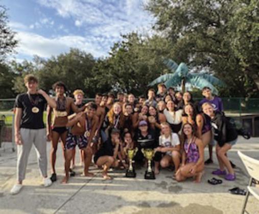 Jubliant Celebration High swim teams celebrate winning both the boys and girls Orange Belt Conference team titles Thursday. SUBMITTED PHOTOS