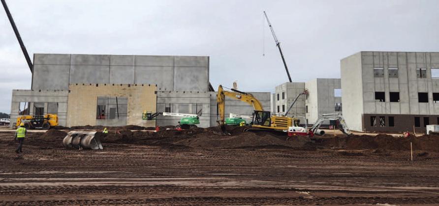 While the Osceola County School District held its ceremonial groundbreaking at its ninth traditional public high school Friday, work has been ongoing toward its planned August 2026 opening. PHOTOS/KEN JACKSON