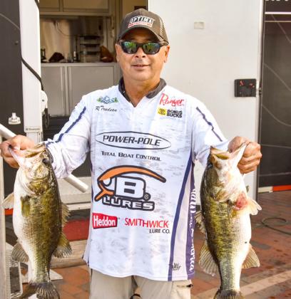 St. Cloud’s Ray Trudeau (with two fish) and Richard Ralston took home big fish and bigger prizes at last weekend’s Major League Fishing Phoenix Bass Fishing League Gator Division tournament on the Kissimmee chain. PHOTOS/CINDY JOINT