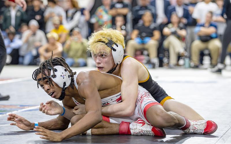 The last time Harmony's Nathan Lyttle took to the mat at the Silver Spurs Arena he he outlasted Lake Mary’s Damonyai White, 2-1, to win the Class 3A 113-pound state championship.  (File Photo)