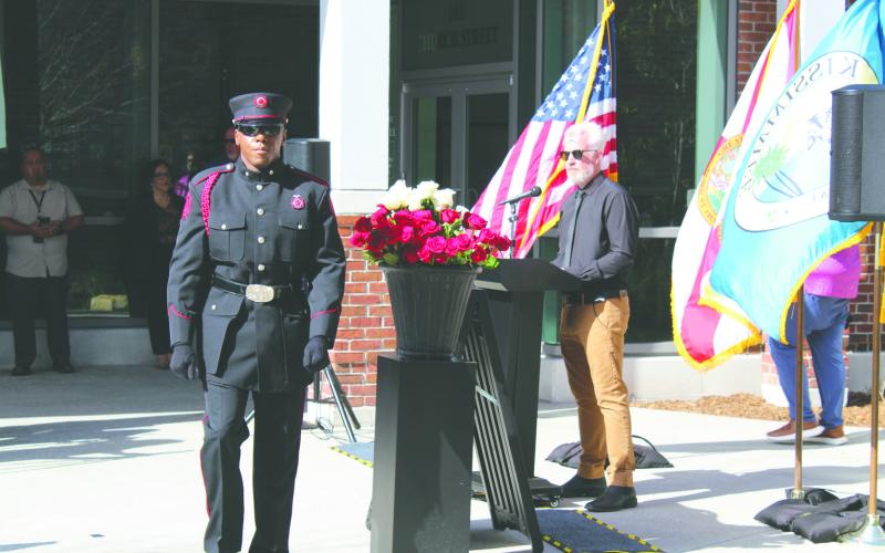 Co-workers, family members and Kissimmee’s responder honor guard members placed roses in the memory of employees who have passed at the city’s annual Employee Memorial Service Friday at the City Hall rain garden. (Photos/Ken Jackson)