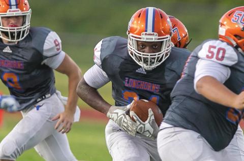 Fooling nobody, Harmony tailback Tyler Emans set season rushing and scoring records in just nine games. FILE PHOTO