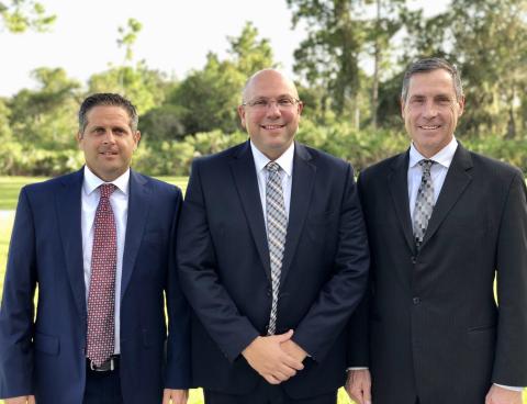 From left are Scott Sager, first counselor; Ryan Munns, stake president; and Clint Richardson, second counselor.