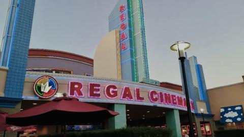 Regal at The Loop neon is ready for National Cinema Day’s $3 extravaganza. PHOTO/CHRIS MILLER