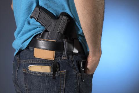 State Democrats argue easing gun restrictions would increase violence, while some gun-rights groups — which want people to be able to openly carry firearms in most public places — call the proposal “too weak.” PHOTO/METRO