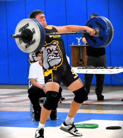 St. Cloud's Conner Howes won both the traditional and Olympic events in the unlimited weight classes Friday to help the Bulldogs to the Orange Belt Conference weightlifting team championship. PHOTO/KATIE WILLIAMS