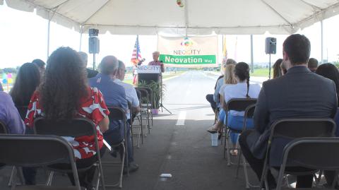 Sitting right on the road, Osceola County leaders cut the ribbon on Neovation Way, which will connect Neptune Road directly to NeoCity. PHOTO/KEN JACKSON