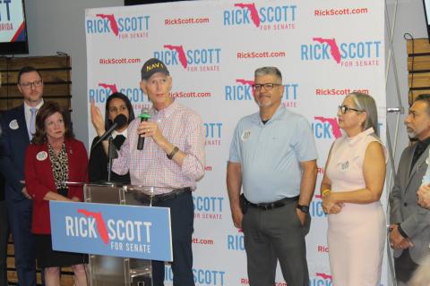 Sen. Rick Scott, joined by local Hispanic coalition leaders and elected officials, came to Kissimmee Thursday to rally support for the election.  PHOTO/KEN JACKSON
