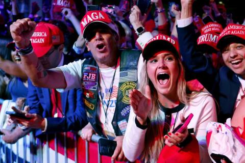 Supporters react at a West Palm Beach election-night event with former President Donald Trump. (Photo by Chip Somodevilla/Getty Images)