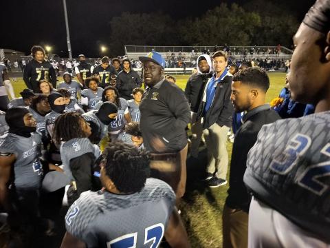 Osceola Coach Eric Pinellas talks to his happy, but focused Kowboys following Friday's 35-6 Class 6A Region 2 semifinal rout of Plant City Durant. PHOTO/J. DANIEL PEARSON