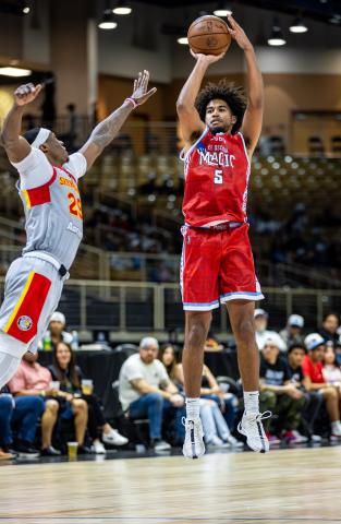 Ethan Thompson goes up for three of his game-high 29 points in the Osceola Magic's 115-107 win Friday over the College Park Skyhawks. PHOTO/TAYLOR MCFEE
